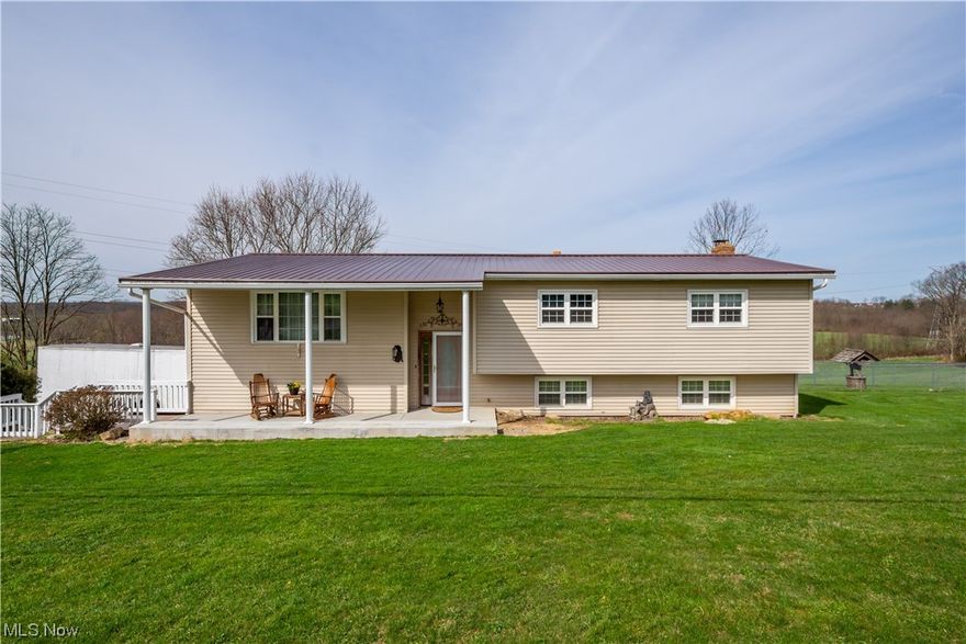 Welcome to your dream home in the country! This 3 bed 2 bath bi-level home is situated on nearly 8 and a half acres of picturesque countryside. The living room, rec room, and den offer ample room for relaxation and entertainment. The large porch and patio make the perfect spot for outdoor living and enjoying the tranquil surroundings. This property also includes a 24X32 detached garage, a 30X40 lofted barn with 3 stalls, a carport, and a new horse run-in shed. Pasture acreage is partially fenced (vinyl, electric tape, & woven wire). Several updates include plumbing throughout, new cement front porch and drainage, a new metal roof on the home, and detached garage, and fencing. Well maintained and in pristine condition, this country home is ready for you to make it your own. Call your agent today to schedule an appointment!