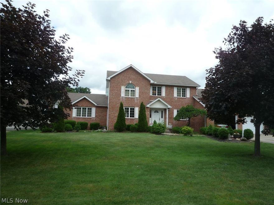 Spacious 2800 sq ft Brick faced Colonial. Two story Foyer with oak staircase.  Sunken great room with fireplace and two skylights offering a lot of natural light. Large ceramic tile kitchen with oak cabinets, breakfast bar, and dinette. Master bedroom offers a master bath with double sinks, jetted tub, and walk-in closet, second bedroom has a huge walk-in closet. First floor laundry. Other features include central air, central vacuum, intercom, security system, large backyard, deck. Call to see now!