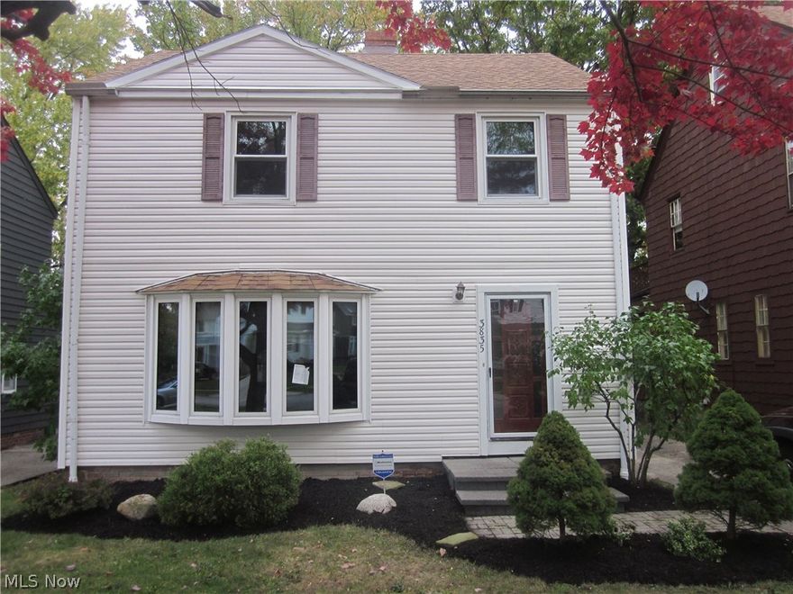 Stunning & Move-in Ready 3 Bedroom Colonial w/Many Updates!  Kitchen w/Granite Countertops * Backsplash * Ceramic Tile Flooring *  New Stainless Steel Appliances * Nice Wood Floors in Living Rm, Dining Rm and Bdrms!  Large Bay Window w/Some Additional Newer Windows!  Full Bath Completely Renovated! New Flooring & Faucets * Light Fixtures * Freshly Painted * Nice Finished Rec Room!  Enclosed Porch!  Additional Living & Storage on 3rd Floor!  Nice Landscaping! New Garage Doors!  Call for Easy Showing!