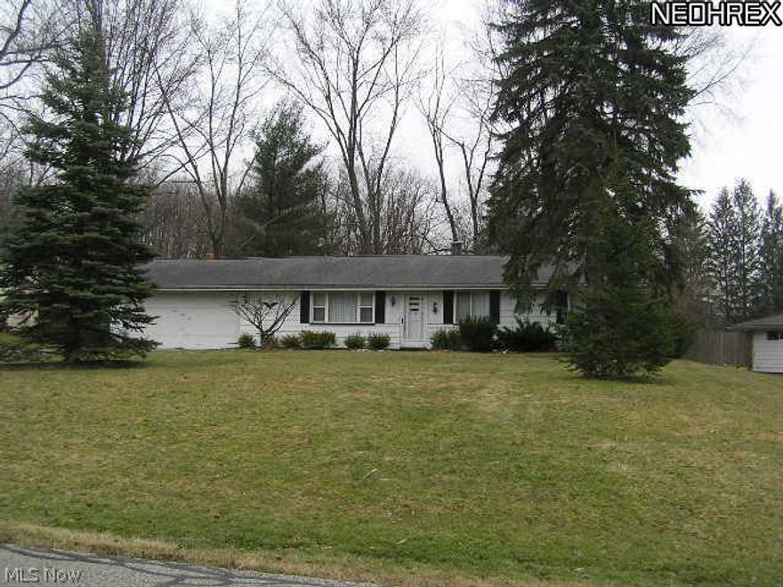 The large fireplaced family room really makes this house a home! Dated but decent, it has an l-shaped living room/dining room combination and a master bath.                                           The utilities are not on and the electric meter has been removed.  When winterized in February 2013, a water pressure test failed to hold pressure.                                        It is the buyer's responsibility and expense to turn them on for any required inspections.                                  Property is being sold as-is and is subject to HUD Guidelines 24 CFR 206.125.