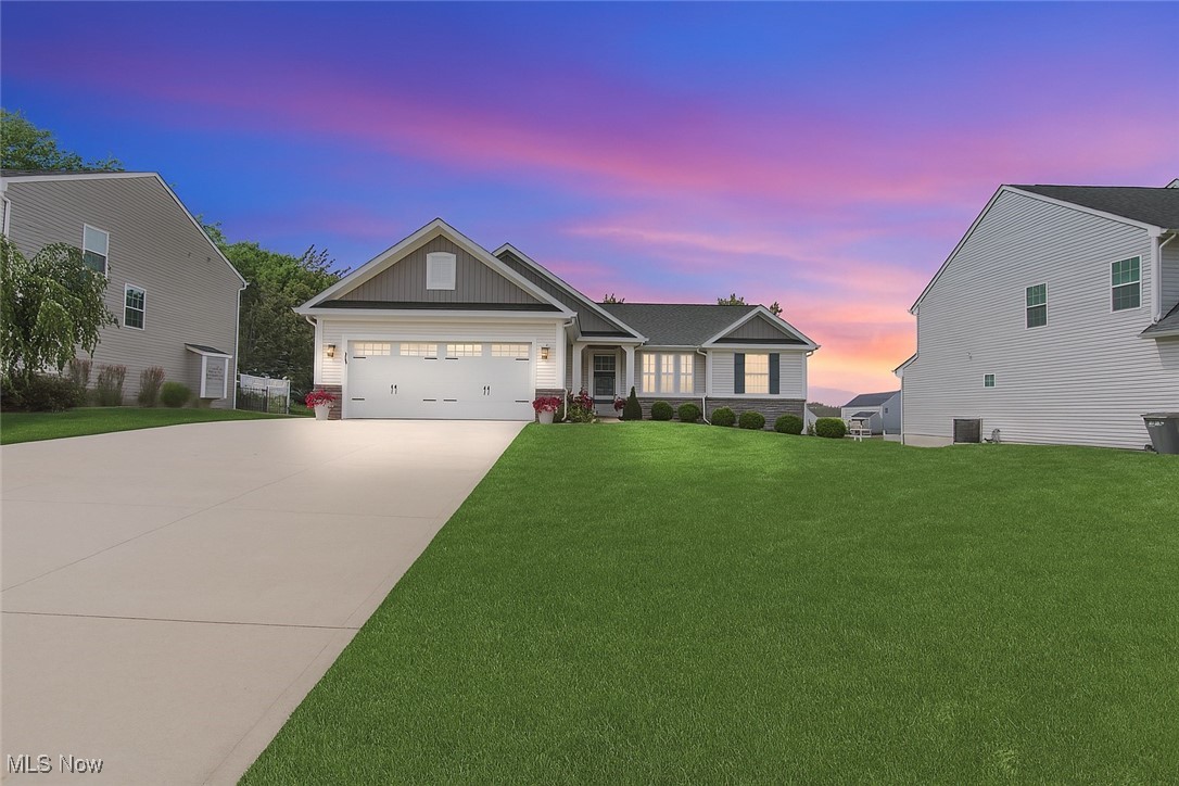 Welcome to this stunning 4-bedroom, 3-full-bath home built in 2018, offering modern design and comfort in every corner. The open-concept main level features a spacious kitchen with quality finishes, seamlessly flowing into the dining and living areas—perfect for entertaining or family gatherings. The fully finished basement includes a large living space, a full bath, and a fourth bedroom with an egress window, making it ideal for guests, a home office, or multigenerational living. Step outside to enjoy the screened-in back patio overlooking a large, private backyard—an ideal setting for outdoor relaxation year-round. With thoughtful upgrades throughout and a layout designed for both function and style, this home is truly move-in ready. Don’t miss your chance to own this exceptional property!