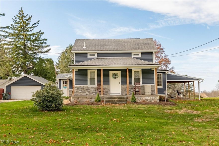 Experience country charm with this inviting 3-bedroom, 2.5-bath farmhouse on 1.63 acres in Washington Township! A welcoming front porch sets the tone as you step inside to an updated eat-in kitchen featuring warm granite countertops, oak cabinetry, and plenty of space for everyday meals. Two distinct living areas offer the perfect balance of comfort and openness—one a cozy retreat with a stunning stone wood-burning fireplace, the other a spacious, sun-filled room ideal for gathering and entertaining. A full bath and convenient first-floor laundry add practicality to the main level.

Upstairs, the primary bedroom provides a peaceful escape with its tastefully updated en-suite and generous walk-in closet. Another bedroom enjoys its own private half bath, perfect for guests or family.

Outside, the two-car garage and expansive lot provide endless potential for gardening, recreation, or simply enjoying the peaceful setting. Located in Marlington Schools and directly across from the Huston-Brumbaugh Nature Center, you’ll have scenic walking trails and natural beauty right at your doorstep.