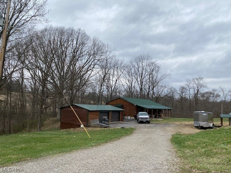 Nice Log Home in The West Muskingum SD.  Situated on 4 plus acres.  Barn and detached garage.  1 of the bedrooms is large enough to divide into two bedrooms