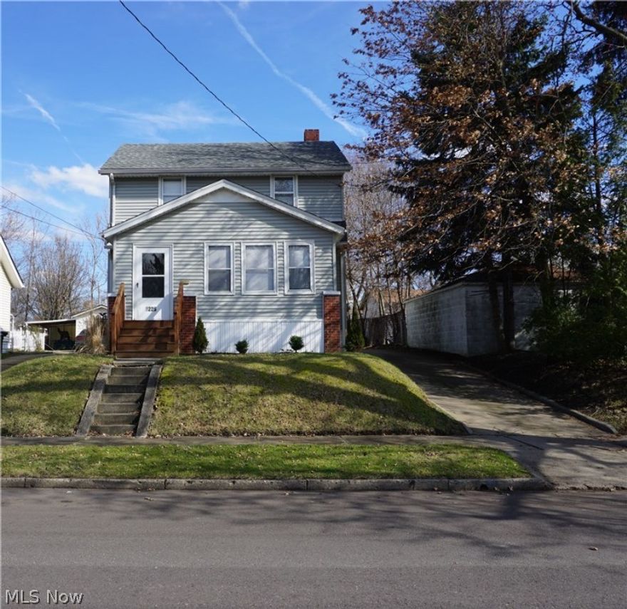Fantastic remodeled 3 bedroom 1 bath house in South Akron.  Ready to move in.  Kitchen has new countertop and refinished cabinets with ceramic flooring.  Dining room and living room have new laminate in a dark wood design.  All new carpet on the second floor with a completely remodeled bathroom.  Convenience is everything.  Minutes to 77, close to Akron University.   You must see how nice this house is!