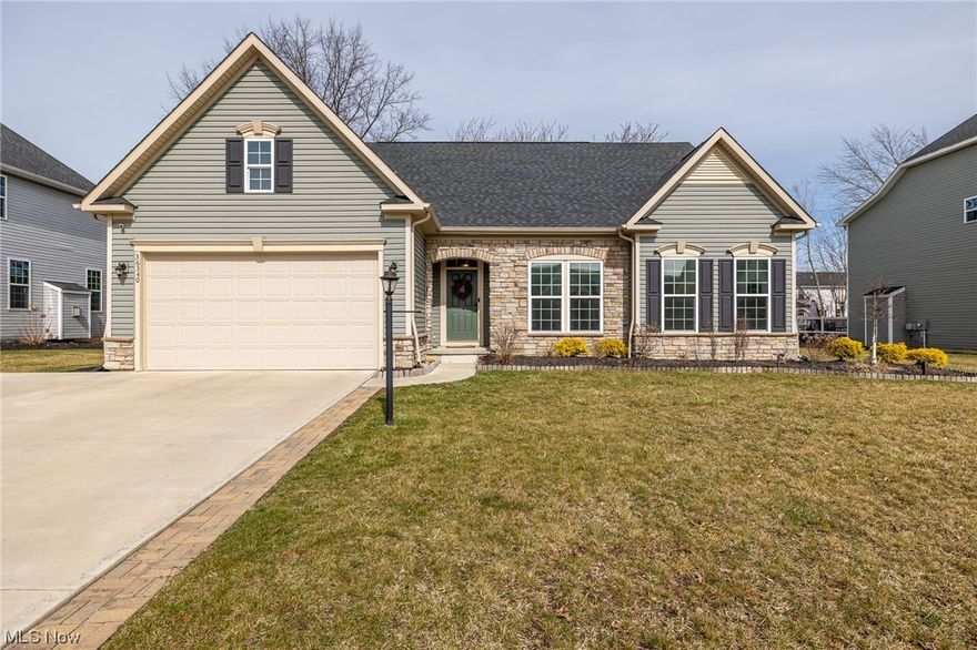 Welcome to 36340 Atlantic Ave, a charming and inviting ranch home nestled in the heart of North Ridgeville. The open-concept layout seamlessly connects the living room, dining area, and kitchen, creating a perfect setting for both relaxed family gatherings and entertaining guests. The living area features high coffered ceilings, a fireplace, and lots of natural sunlight. The chef's kitchen with center island, granite countertops, beautiful backsplash, pantry & spacious dining area has been updated with all new appliances. The primary bedroom suite is wheelchair accessible and has access out to the covered deck. The primary bathroom features a double vanity, updated tile shower, new hardware and mirror. 2 more comfortable bedrooms, 2nd full bath, laundry room and mud room complete the main level. The large, finished basement is perfect for recreation and entertaining. It includes a full bathroom and tons of extra storage space. The whole house has fresh paint, new carpet, and new window treatments. The backyard and been transformed with landscaping, drainage system, and a fence. The backyard also features a covered deck, patio, brick fire pit, and large shed. Community pool to enjoy in the warmer months! A true must see home!