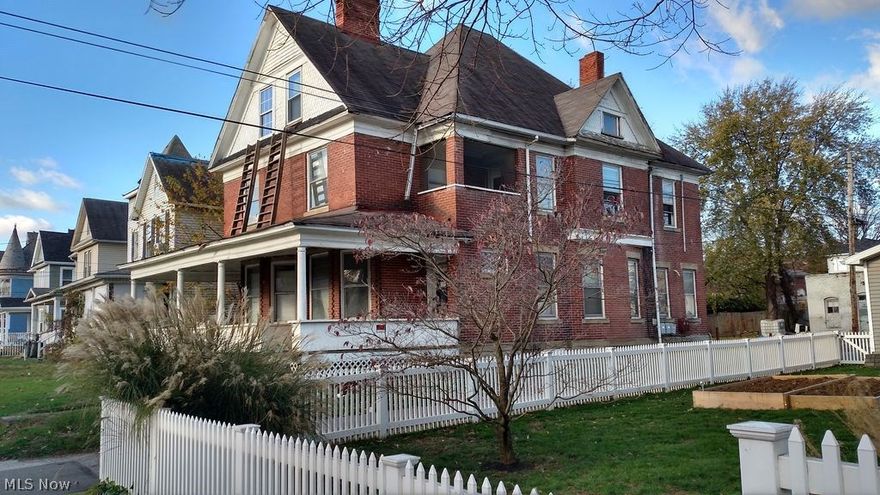 This duplex has so much potential and could be made into a great income producer.  The beautiful brick duplex was built in 1910 and has been gutted down to the studs, baring all the old home character and is ready for a complete makeover.  Each unit has four bedrooms, one and a half baths, first level living room curved wall, original brick fireplaces, pocket doors, hardwood floors, wood mantles, built in shelving and a small balcony on the second floor.  The attic space has the possibility of additional bedrooms and has a beautiful ship-lap wall.  This truly is an investor's dream! Being sold "As Is".