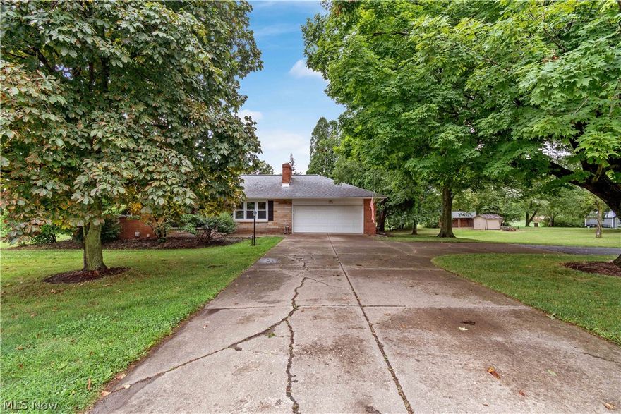 Check out this well maintained, updated ranch in Dalton LSD!  As you enter through the front door you'll be welcomed to a large living room with original hardwood floors and fireplace.  Head left down the hallway and you'll find 3 good sized bedrooms and a full bathroom. A galley style eat-in kitchen w/ stainless steel appliances finishes off the first floor.  There is a 3 seasons room off the back of the 2 car attached garage that makes for great additional entertaining space. Full, partially finished basement with fireplace and full bath.  Beautiful .8 acre lot with country views all around.  Schedule your private showing today!