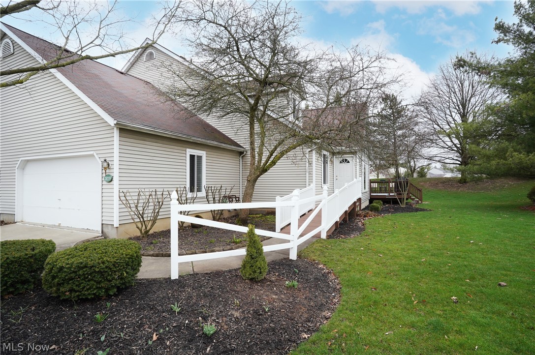 Looking to go into a condo but not downsize? This is the condo for you! Rare opportunity to live in a Ranch but have 2 extra living spaces for visitors or other family members, upstairs or downstairs. 1st floor great room w/cathedral ceiling, open to dining area & "window" to the kitchen, & view of the loft. 1st floor has lg master bedroom w/cath ceiling & ceiling fan, walk-in closet & master bathroom w/double sinks, rain glass wind & luxury vinyl flooring. There's a second 1st floor bedroom & second 1st floor bathroom, both w/35" doors for handicap accessibility. Bedroom has double closet & the bathroom has a roll-in shower. Dining area has crown molding. Kitchen has tons of Merillat soft-close cupboards & counter space. If that's not enough, there's a portable island w/breakfast bar & couple cabinets. There are 2 pantries, one is a converted coat/broom closet & could go back to that. All the stainless steel appli will stay. Entry to the attached garage is at the end of the kitchen, for easy grocery unloading. Upstairs is a large loft that is perfect for an office or sitting room, w/2 bedrooms plus a full bathroom-perfect for second living area or visitors. Both bedrooms have 2 double closets, one w/dormer area. Lower level has finished, carpeted rec room & full bathroom w/step-in shower w/2 seats. Unfinished area has laundry area w/utility sink & lots of shelving that will stay. Basement is 11-1/2 course block, has sump pumo (batt back-up not staying), 150-amp electric box, & glass block winds. Attached 2-car garage w/extra storage area, water, bike hooks & attached shelving. There is ramp to the front door for additional handicap accessibility. Updates include: new flooring & paint for entire first floor & loft 11/2021; new furnace & C/A by Blind & Sons 06/2016; new Casperson windows on 1st floor 01/2018; new Window World windows on 2nd floor & garage 02/2022; hot water heater 09/2023; microwave 02/2024, other kitchen appliances approx 10 years. See it today!