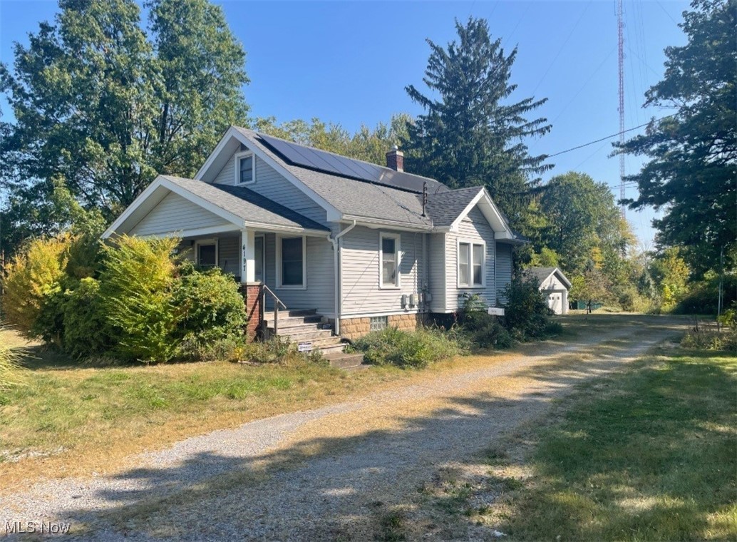 A lot for a little is this 2-3 bedroom vinyl sided bungalow. Features living room, formal dining room with hardwood floors throughout, Natural woodwork, kitchen and full basement. Nice front porch. Acre and a half lot. Double car garage. Free gas. Nice front porch and more!