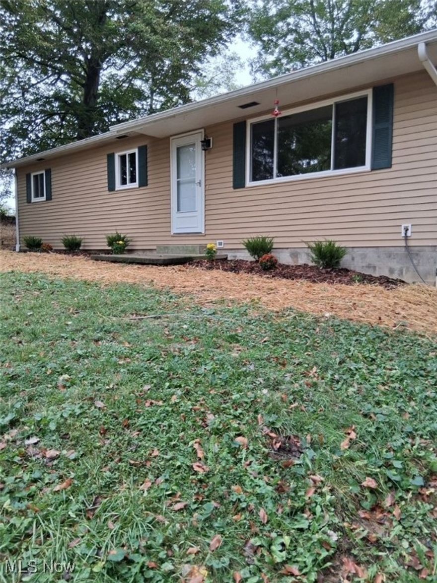 Newly remodeled home in West Muskingum Schools. Move in ready, Beautiful wood floors in 3 bedrooms, living room, and kitchen. Fully applianced kitchen, and new ceiling fans. New wood deck on side leading into kitchen area. Large deck on back. New plumbing, heating, and insulation.