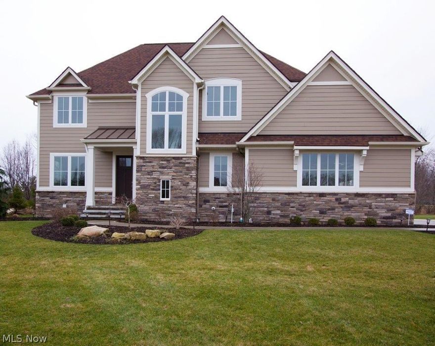 2014 Payne and Payne Builders custom home built by an employee. Located within walking distance to clubhouse and golf course in Barrington. 

This custom family friendly design is open, spacious, and ideal for entertaining! 

With 2x6 wall construction there are taller height ceilings on the entire first floor (10 foot tall) and extra insulation for a super efficient new home! There are giant walls of windows (7 feet tall glass), big custom doors (8 feet tall), natural hardwood flooring and thicker than normal trim including 7 inch tall baseboard. Full Basement is upgraded in height at 13 courses and roughed in for future plumbing of toilet, sink, and shower. 

The gourmet Custom Kitchen is open to the Great Room and designed to accommodate guests. It features Kraft Maid Cabinetry (Midnight Blue) and 2 islands with granite so the chef has an island for prepping food/drinks and a 2nd island for seating of guests. 

A large hearth/dining room on the back of kitchen serves both ca