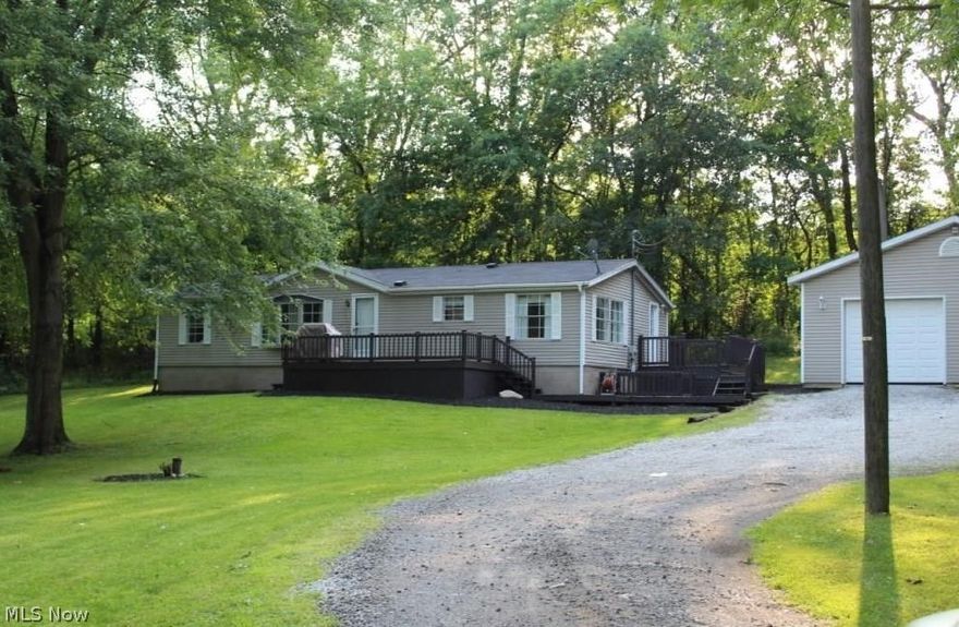 Lovely secluded home on the outskirts of Louisville with 2 acres!  Park-like setting.  Home features 3 bedrooms, 2 baths and hue unfinished basement.  Extremely well-maintained and tastefully decorated.  Large, over-sized 2 car garage and above-ground pool.  New furnace in 2017 and sump pump new in 2015.  2 side decks & front deck surround the home.  Must see!