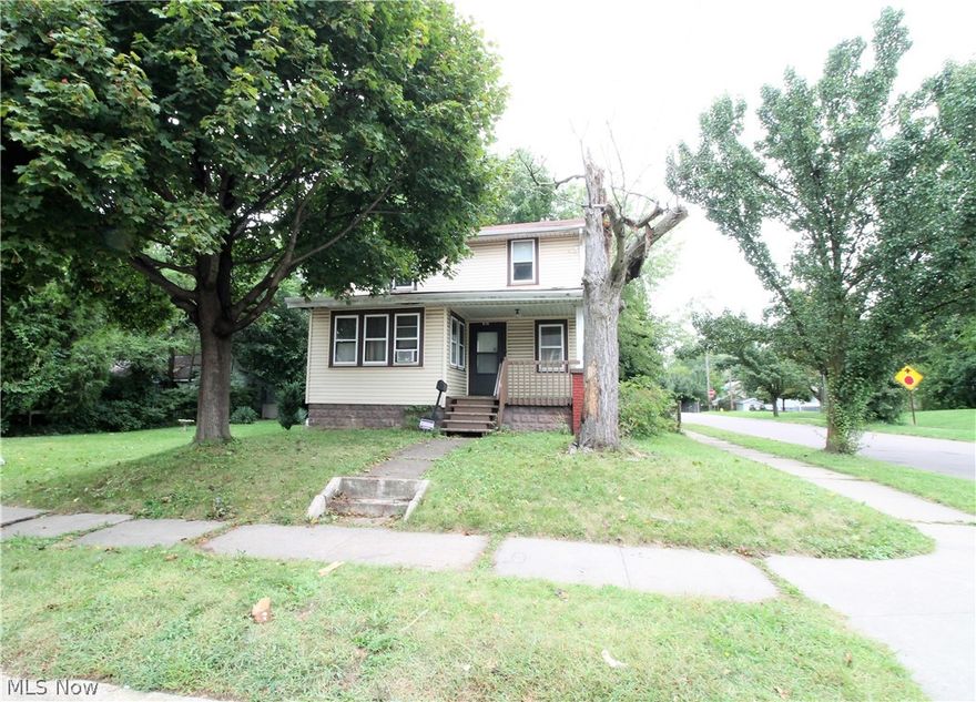 Endless Possibilities! Welcome to this two bedroom, one full bath colonial home. Come on up to the front covered porch that has plenty of room for small table and chairs and into the living room, dining room which offers large windows for natural sun light to shine through. The kitchen has lots of cabinets, stove, refrigerator. There are two large bedrooms upstairs with a full bathroom offering newer flooring. The full unfinished basement has glass block windows. There is a large, beautiful backyard and side yard offering two storage sheds. Plenty of room to entertain or just sit out and relax. The electric is updated, newer siding and roof. Call this home your own or rent for investment.