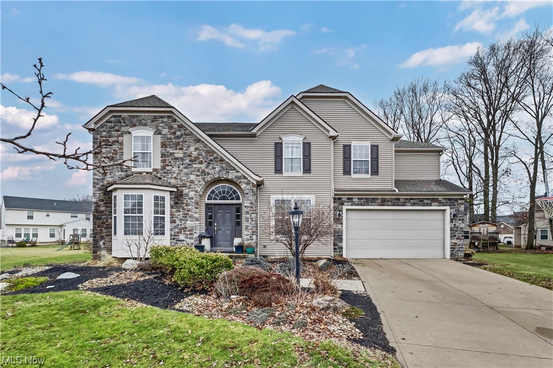 Stunning, custom-built home in a cul-de-sac of the exclusive Stonebridge Creek community. This home is just minutes away from the highway making your travels anywhere convenient. The main level features a grand 2-story entrance with a gorgeous custom railing design. As you walk into the open concept living space, you will find a spacious 2-story great room with a fireplace that opens up to a large eat-in kitchen complete with a massive island, sunroom for additional seating, and a walk-in pantry. As you move around the kitchen, you’ll find a large sliding glass door that supplies natural light to the interior and as you exit this leads to an oversized patio in the back of the home that shows off the impressive backyard. The first floor also includes an office, formal dining room, and conveniently located laundry room. On the second level you’ll find all the bedrooms are very spacious including the master which has a massive walk-in closet and ensuite bathroom. The basement has plenty of room for storage and also has a rough-in for a future bathroom. This home has had only 1 owner and was only built in 2007. It move in ready for its next owner!