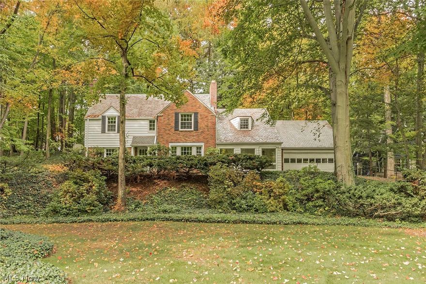 Beautiful 4bd/2.1 bath colonial on South Belvoir situated on a private wooded lot! Formal rooms throughout w/ gorgeous hardwood floors. Eat in kitchen w/ granite and all appliances. Cozy family room w/ built ins that spills out to the 4 season sun porch w/ walls of windows looking into a peaceful quiet yard. Large master bedroom on second floor houses a great walk in closet and master bath. Three remaining bedrooms all w/ hardwood floors share main hall bath. Finished lower level rec room area w/ woodburning fireplace, a remodeled laundry room, workshop and storage galore. 2 car attached garage. The yard is spectacular w/ a stamped concrete patio and a pavered patio, fish pond, lush landscaping, basketball court and loads of privacy - great for a nature lover! Meticulously maintained and care for over the past 27 years.