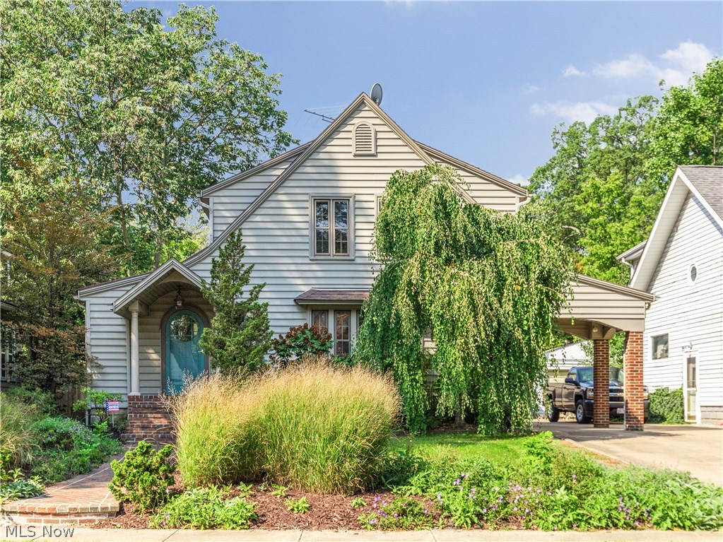 A brick walkway leads to this phenominal Cuyahoga Falls Colonial that features over 1600 square feet of incredible living. With hints of the past meshed with a flowing open floor plan, this home combines the best of the old and the new. The spacious living room is accented with rich wood molding and a 5 panel window that maintains the homes charm. The impressive kitchen boasts red oak cabinetry with convenient pull outs + a huge island with plenty of room for seating. The kitchen is open to the family room area, where you are surrounded by glass sliding doors that bring the outdoors to you while eating or relaxing. The formal dining room exits to a fabulous sun room. Outside decking can be accessed from the kitchen, family room and sun room allowing for the most perfect entertainment opportunities. Three nicely sized bedrooms and a full bath with a vaulted ceiling and jacuzzi tub complete the second floor of the home. Vinyl siding, newer two car garage and a car port with brick col