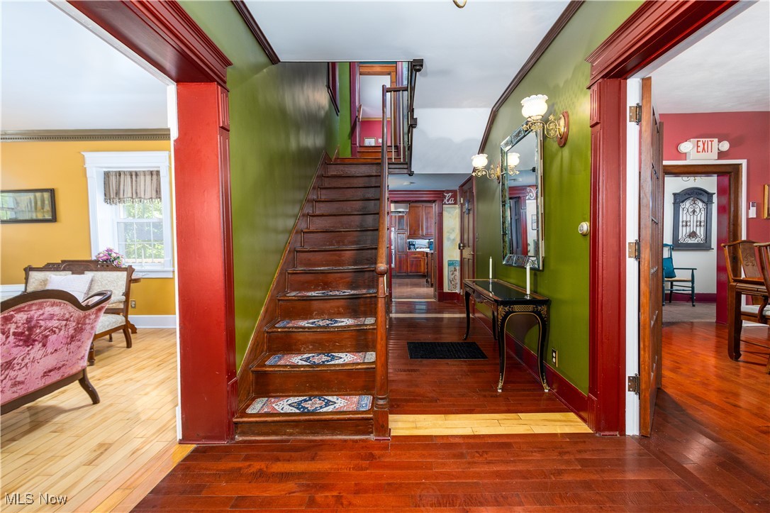 Unlimited possibilities!!! Is currently an Air B & B, Bed & Breakfast. You can make it whatever suits your needs! Beautifully remodeled 2 story home with 4-5 bedrooms, 1 full bath & 2 half baths. Home has several stained-glass windows. Huge kitchen with commercial hood fan, big center island & lots of cupboards. Per seller, home has newer propane furnace (2023), roof (2020), heat pump (2018) & 2 50-gallon hot water tanks (2019). Main level has living room, dining room, kitchen & 2 half baths. Interior freshly painted. Full bath upstairs has hook-up for stackable washer & dryer, along with the bedrooms with cedar lined closets. One bedroom has sunroom off rear & second bedroom has attached nursery or possible huge dressing room. Washer & dryer stay with home. Walk-up attic that can be finished for extra room. Home was established in 1803 & has 3 covered porches. Home is serviced by county water & also well water. There is a fountain outside (not used for some time) & a fenced dog pen.