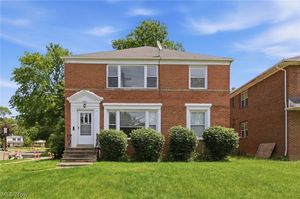 Photo of 2341 Warrensville Center Road, University Heights, OH 44118 (MLS # 5216175)
