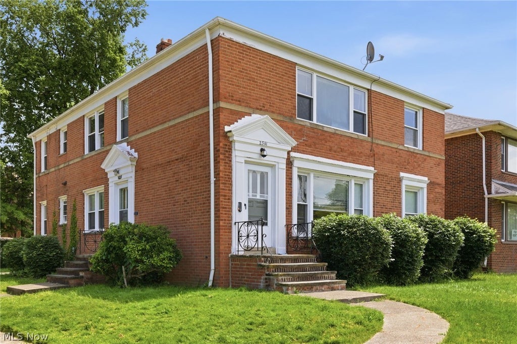 Photo of 2341 Warrensville Center Road, University Heights, OH 44118 (MLS # 5216175)