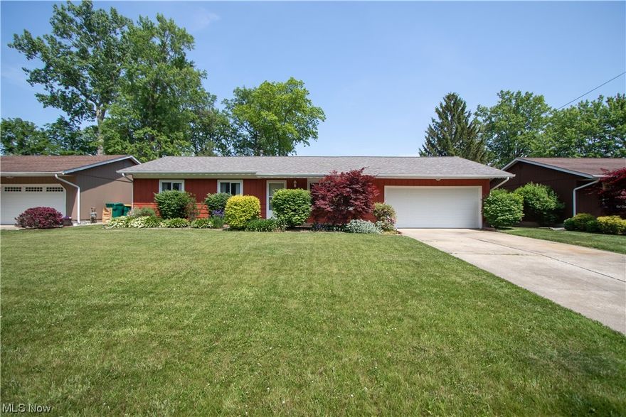 Adorable, well cared for 3 bedroom, 1.5 bath ranch ready for new owners! The spacious living room flows nicely to the updated eat in kitchen featuring quartz counter tops, a gas range and plenty of cabinet and counter space. Off the kitchen you will find the huge laundry/mud room with access to the garage. The sliding glass doors off the dining area lead to the back deck and hot tub in the expansive fenced in backyard perfect for entertaining friends and family. You will also find a shed and garden area. There is a half bath off the kitchen with access to the large primary bedroom. Down the hall you will find the additional 2 bedrooms and full bath.  Great location close to Lake Erie, Fairport Harbor and Mentor-On-The-Lake and is walking distance to the Mentor Lagoons Nature Preserve trail and so much more! This is a very sought after area so don't wait! Schedule your tour today!
