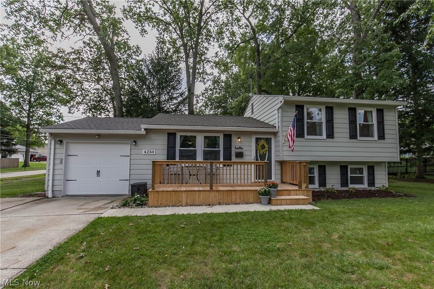 Don't miss this amazing opportunity to own a beautiful home with many updates in Stow, Ohio. Walk in to an open layout with new hardwood floors in the living room and all bedrooms. This home features two living spaces which is great for entertaining or a possible home office. The updates include new roof and gutters in 2014, new counter tops in the kitchen, fresh paint in the whole house, new windows, and front porch/deck done in 2018. The second living space offers a marble gas fireplace with unvented gas logs. Conveniently located near shopping and highway access. Call for your showing today!