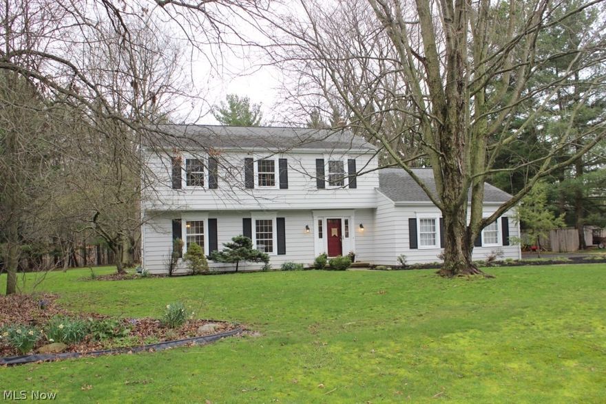 What an opportunity to live in this very desirable North Hudson community of Connecticut Colony. A community of active families including an active association with many events planned throughout the year. There is a park, Hudson Park West, that is assessable from the neighborhood as well. This lovely home is ready for you to move right into. The freshly painted walls bring out the brightness of each room where the outside privacy shines through. Hardwood floors throughout the first floor glimmer. There is a Living Room that spans most of the width of the home and leads to the Dining Room that includes three windows that overlook the large backyard. The updated Kitchen is a asset and is completely open to the Family Room. The Kitchen involves a granite countertop, countertop range, built in microwave, double ovens and hardwood flooring. The Family room boasts a magnificent brick wall with a gas log fireplace and beautiful wood mantle. The sliding glass door leads from the Family Room o