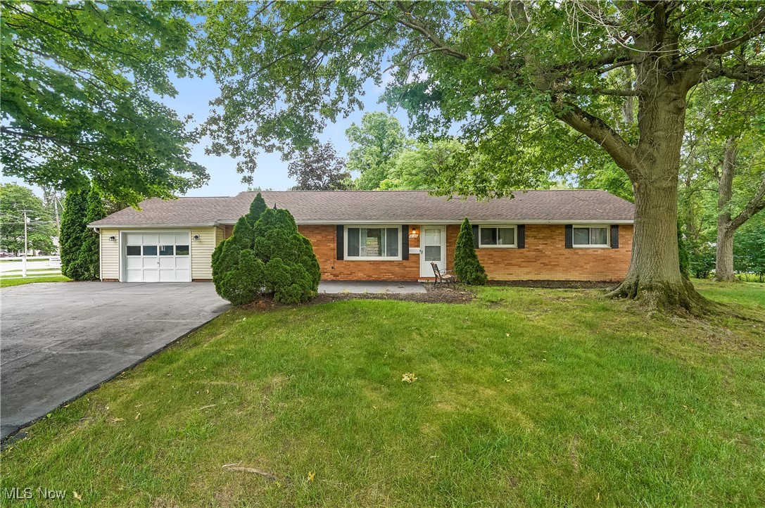 Looking for one level living? This brick ranch offers everything on one floor. Entering the front door you will see a spacious living room with carpet flooring. To the left of the living room is a family room with carpet. Off the family room is the first-floor laundry room complete with washer and dryer. The kitchen with vinyl flooring boasts a stainless-steel gas range (6/25), a stainless-steel built-in dishwasher and a stainless-steel refrigerator. There is also a walk-in pantry in the kitchen. There are 3 bedrooms, one of which has a private full bath off the bedroom. There is a guest bathroom in the hallway. Ceiling fans in all bedrooms, living room, dining room and family room. Vinyl windows. The backyard has a generous sized deck and a wood privacy fence with 2 gates. There is ample parking in the oversized driveway. A nice sized side yard adds to the lawn space at this home. The roof is asphalt/fiberglass dimensional shingles. The owners are offering a home warranty with the home. Close to many of the city amenities, shopping and dining.