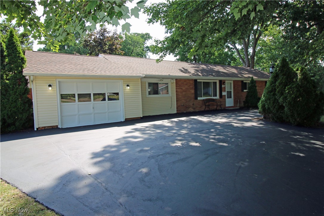 Looking for one level living? This brick ranch offers everything on one floor. Entering the front door you will see a spacious living room with carpet flooring. To the left of the living room is a family room with carpet. Off the family room is the first-floor laundry room complete with washer and dryer. The kitchen with vinyl flooring boasts a stainless-steel gas range (6/25), a stainless-steel built-in dishwasher and a stainless-steel refrigerator. There is also a walk-in pantry in the kitchen. There are 3 bedrooms, one of which has a private full bath off the bedroom. There is a guest bathroom in the hallway. Ceiling fans in all bedrooms, living room, dining room and family room. Vinyl windows. The backyard has a generous sized deck and a wood privacy fence with 2 gates. There is ample parking in the oversized driveway. A nice sized side yard adds to the lawn space at this home. The roof is asphalt/fiberglass dimensional shingles. The owners are offering a home warranty with the home. Close to many of the city amenities, shopping and dining.