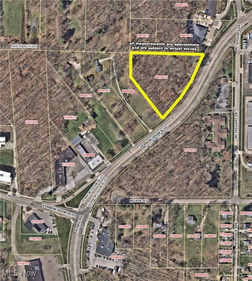 2.39 Acres of Land. Utilities available. UPD-13 Zoning includes multi-family, retail, commercial, as well as other use categories. Currently approved for 25 townhomes, ready for building permits. Traffic count is 15,000 per day. Check zoning for your particular use. Located just west of the I-77/I-76 Interchange.