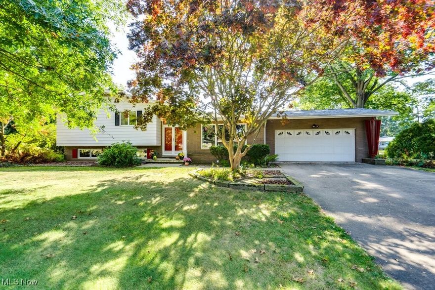 Welcome to 3116 Sherbrook Dr, a delightful residence nestled on a serene large lot in Uniontown. This inviting home combines classic mid century modern charm with smart updates!  The open-concept floor plan offers ample space for both relaxation and entertainment. The bright and airy living room features large windows that fill the space with natural light, while the cozy fireplace adds a touch of warmth. The home boasts several generously-sized bedrooms (hardwood under bedroom carpet).   The lower level features a gracious second living space that includes a flex space for an office or 4th bedroom, full bath, and even a kitchenette!  Come enjoy the beautiful Ohio seasons in the private backyard and large sunroom!  Located in a friendly neighborhood, this property offers easy access to local schools, shopping, dining, and major highways, making it ideal for both relaxation and commuting.  Update include roof (2022) septic (2023) Water heater (2020) Dishwasher (2022)Iron Filter (2018) Reverse Osmosis (2018) 3116 Sherbrook Dr is more than just a house—it’s a place where you can create lasting memories. Don’t miss the opportunity to make this charming retro property your new home.