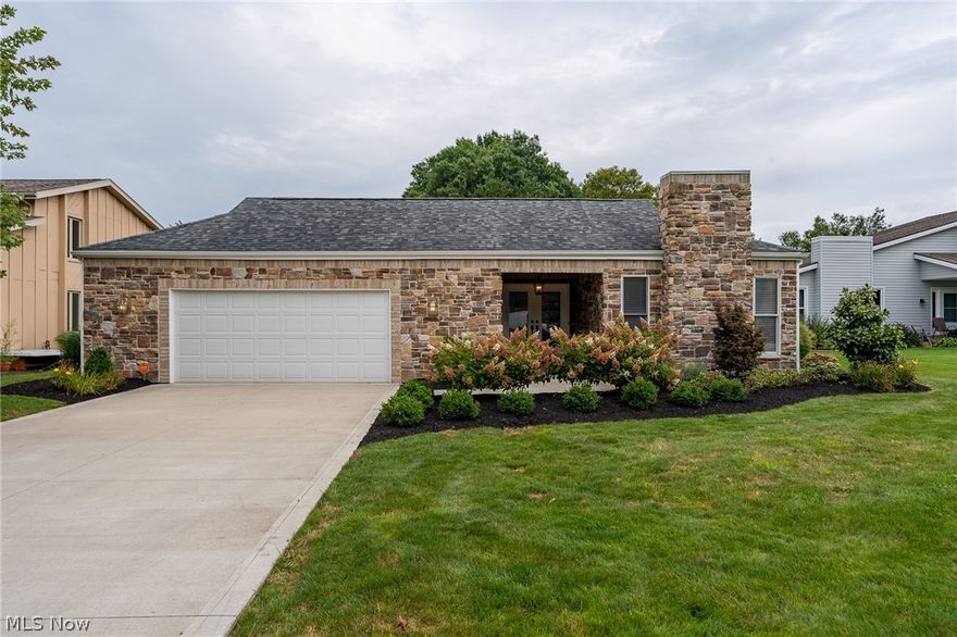 Truly a fabulous large ranch with all one floor living. Gorgeous stone/vinyl exterior and beautiful outdoor lighting that gives stunning curb appeal at nighttime. Over 2488 sq. ft. with additional 1200 sq. ft. rec space. Enter into a spacious foyer with warm inviting wood floorings with sliding door access to your own private courtyard with artificial grass. 3/4 spacious bedrooms or office and updated bathrooms. 16x11 Covered porch overlooking backyard that steps down to a stamped patio for your 3 season entertainment. What a rare find! Oversized 2 car garage. Updated utilities and 200 amp service. Convenient location to walking trails, quick access to highway, shopping, groceries and dining. Located in Plain Local School District.