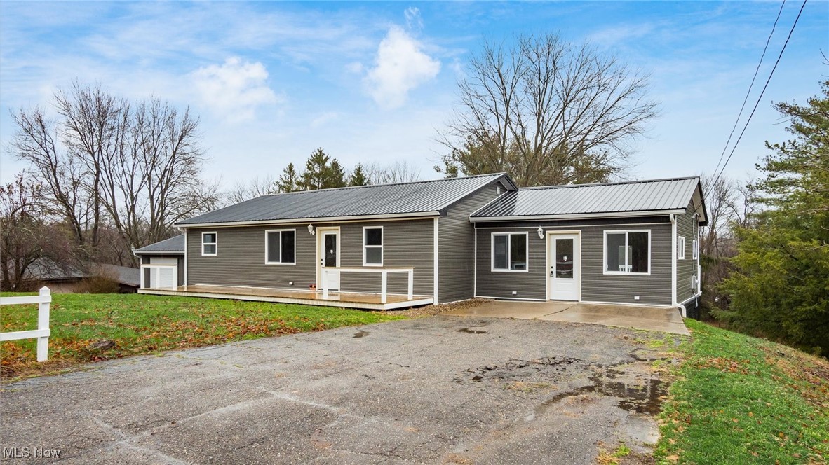 Beautifully Renovated Home in East Muskingum Schools – Guernsey County Taxes!
Welcome to this fully updated 3–4 bedroom, 2-bathroom home located on desirable Skyline Drive! Step through the front door into a spacious living room, perfect for relaxing or entertaining. The layout flows seamlessly into the updated kitchen and an expansive family room — you'll never run out of space when hosting gatherings!
Down the hallway, you'll find three cozy bedrooms and a stylishly updated main bathroom. The home features all-new drywall, carpeting, lighting, plumbing, and electrical throughout, according to the owner. A brand-new furnace and central air conditioning system ensure year-round comfort.
Need more space? The basement offers ample storage and includes a finished room with a closet that could serve as a fourth bedroom, home office, or guest suite.
Outside, enjoy a large backyard with plenty of room for outdoor fun, and unwind on the back deck — perfect for summer evenings or morning coffee.
Don’t miss your chance to own this move-in-ready gem in a great location with low county taxes and highly rated schools!