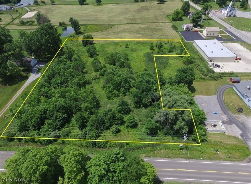 Great location and business opportunity in the center of Ellsworth! Nice country setting on just under 3 acres with over 334 feet of frontage with city sewer & gas at the street. Build your business on the front of the property and your new home behind your business. Close proximity to the corner of US State Route 224 (Akron Canfield Rd) and US State Route 45 (S. Salem Warren Rd) in Ellsworth. Zoned commercial.