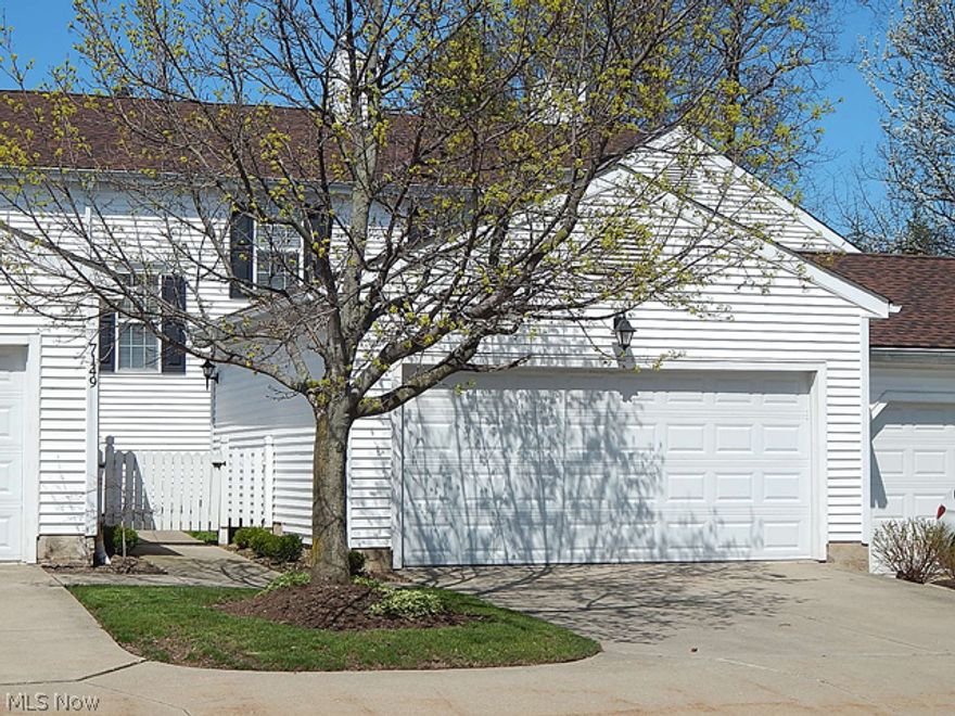 Luxurious 2 bedroom 2 1/2 bath townhouse located in Grand Bay!  This renovated home offers fabulous laminate wood flooring throughout the kitchen and entryway, brand new high efficiency furnace, gas fireplace, new carpeting throughout, oil rubbed bronze lighting & kitchen hardware, new 2” blinds, and is freshly painted throughout.  The enormous master suite has a full private bath and plenty of closet space.  The kitchen features stainless steel appliances, a built-in  microwave, and instant hot water.   Situated off the dining room is a patio with a gas grill, perfect for entertaining. The 2-car attached garage w/ opener also features additional storage and attic access. Completing this offering is a private laundry room with utility tub, wood cabinets, and a closet.  The owner is willing to include a newer front loading high efficiency washer & gas dryer.  You are within walking distance to the swimming pool, private lake, tennis courts, hot tub, and fitness center.  This gorgeous mo