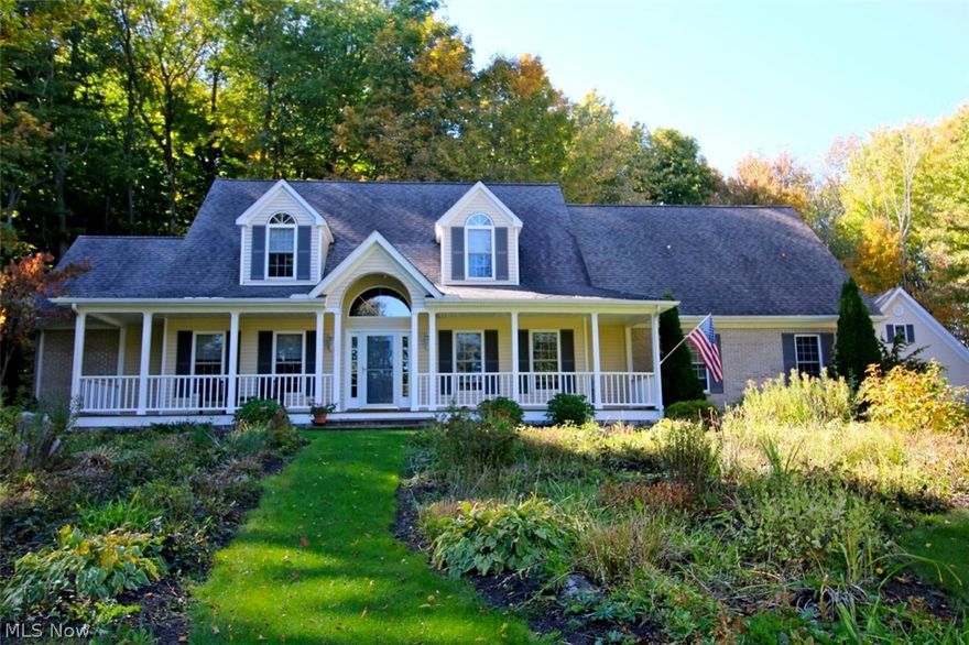 Wow!  This home has it all!  Quality and attention to detail are evident the moment you enter this custom built Cape Cod style home situated on 2.88 gorgeous acres with plenty of trees, privacy, and a tranquil stocked pond.  This 3000 sq. ft., 4 bedroom home has 2 full baths and 2 half baths, and nearly 900 sq. feet of additional living space in the fabulous 3 season room and finished basement.  
As you enter the 2 story foyer, you are greeted by beautiful hardwood floors which flow throughout the great room, dining room, kitchen, and first floor master bedroom.   The two story great room has a gorgeous stone fireplace and French doors to the vaulted 3 season room which provides the perfect place to relax, entertain, or just take in the peaceful views of nature.  The spacious eat-in kitchen has an abundance of cabinet space and gorgeous new granite counters, a wall of windows overlooking the wooded backyard, and a walk in pantry closet.  The first floor master suite boasts his and her