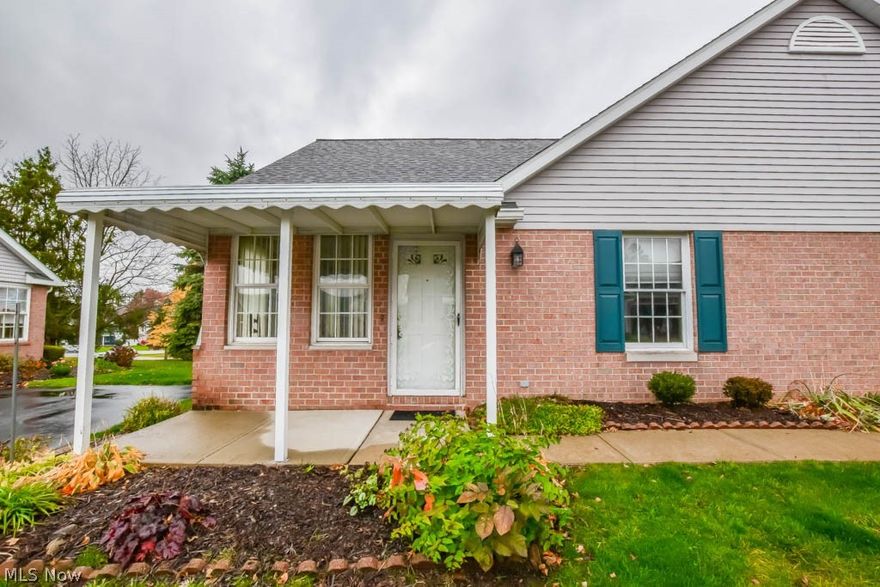 Be the 1st to see this 2 bedroom Lake condo with a basement in the 55+ community of Village Commons!  True one floor living in this all brick unit with an attached 2 car garage. Perfectly sized with a vaulted great room plus a light-filled sunroom to enjoy relaxing with your morning coffee.  The fully applianced kitchen offers plenty of cabinet and counter space, stainless steel stove and refrigerator and space for casual dining. The master bedroom features a walk-in closet and private access to the full bath while the 2nd bedroom can access the bathroom from the hall.  The guest bath includes laundry hookups and cabinets for storage. Updates in the past 4 years include a Carrier furnace and hot water tank. Don't miss your chance to see this move-in ready home in a prime location near all Hartville amenities, call today!