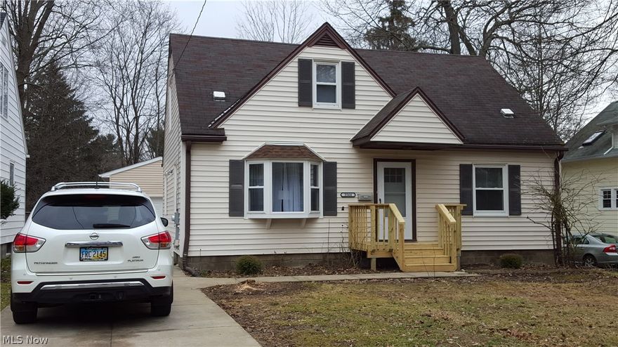 Absolutely adorable 3 bedroom home that has been completely renovated! Refinished hardwood floors throughout 1st floor and new porcelain tile in Kitchen and Full Bathroom! All new paint throughout, even the basement walls have been painted! GORGEOUS kitchen with all new stainless steel appliances (even the dishwasher!); beautiful bathroom with subway tile surround, new vanity, light, bath towel accessories; great natural sunlight and lighting throughout this home and awesome functionality and flow! BRAND NEW GARAGE with vinyl siding, gutters and foundation with concrete floor! New front porch entry and rear deck for entertaining, relaxing and grilling! New furnace, hot water tank and electrical panel! In short, a great home at a great price! Better hurry on this one since its ready to move in and won't last at this price! Being landscaped that's already under contract in the Spring so YES the property will even be nice to match a great home! New front door, also has a nice storm door o