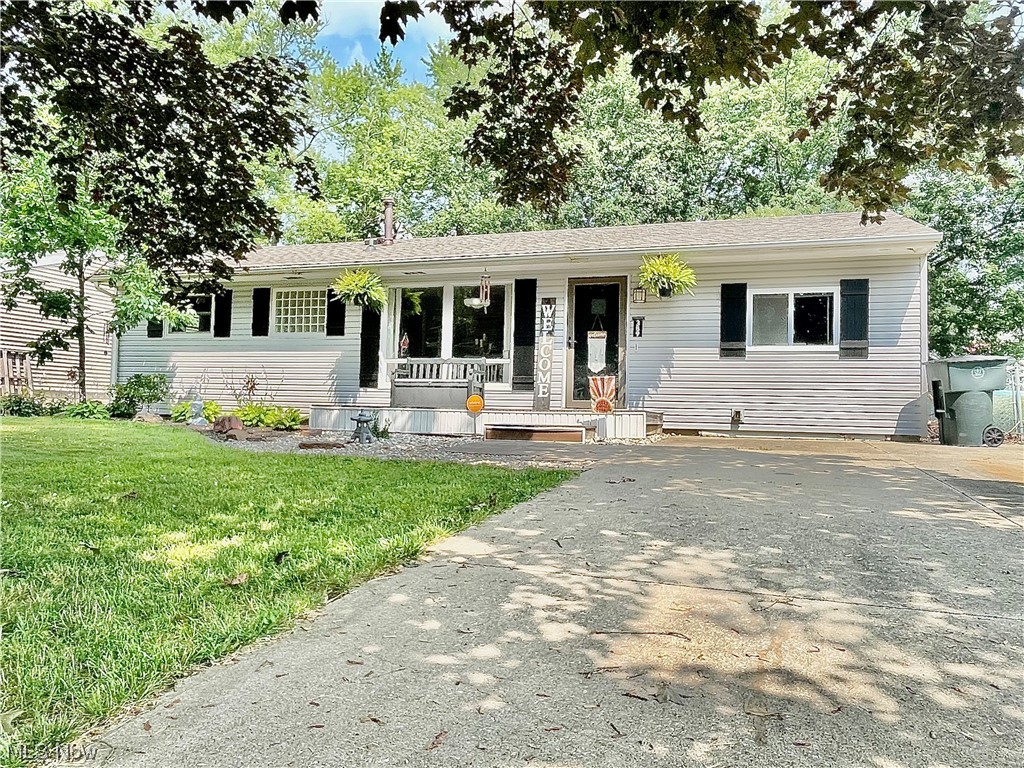 This adorable, nicely "cared for" ranch in Wadsworth may be your next home, but you better hurry! 4 bedrooms and 2 full baths at this price is a rarity! Not to mention that it also has a fully fenced in back yard! Beautiful wood floors and a large family room that leads out to the inviting patio. Let your furry family members run in the fully fenced yard! 3 bedrooms on one side of the house, with the main suite with dual closets, and decorated in a rustic theme is on the other side of the house. 2023, the sellers added new gravel and landscaping. In 2022 a new stove and microwave was added. New The roof, furnace and duct work were all replaced in 2018. A new sump pump was installed in 2020. New siding was installed in 2021! Sellers are offering a Home Warranty as well to give the new buyers piece of mind!