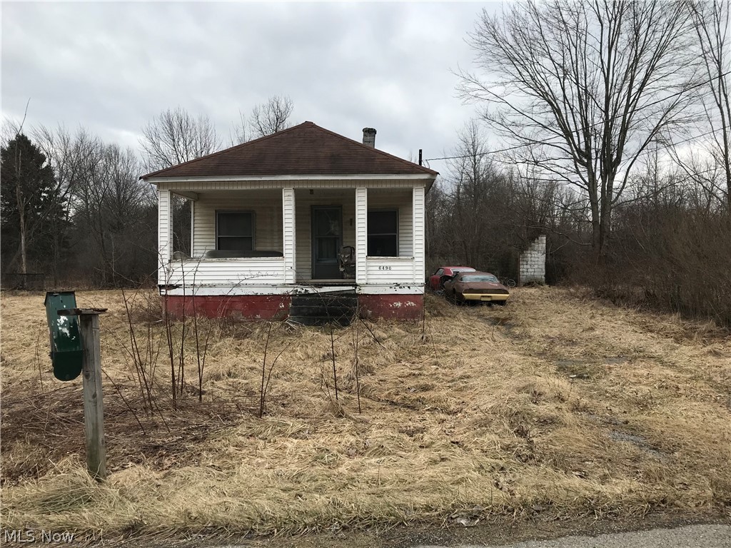 Investor special!! Being sold AS-IS. Home is in severe disrepair. Please DO NOT approach house or try to enter house, there is NO lock box, NO entry available. Value is mainly in the land. Only considering cash offers.