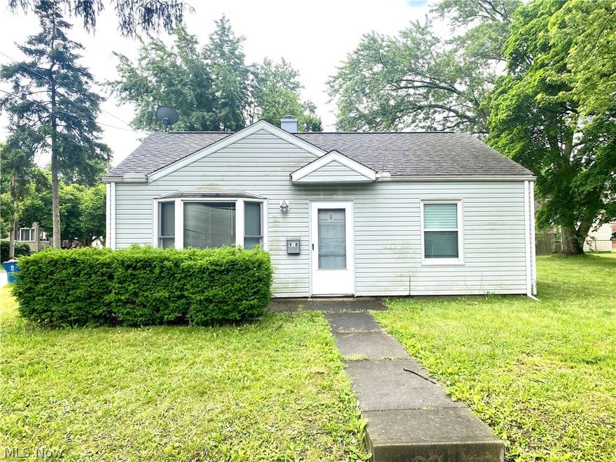 Are you looking for one floor living or a great investment property? Here is your chance! This well maintained, cozy ranch in Akron is situated on a large corner lot. As you enter you are greeted with the open feeling of the kitchen and living room. The living room has newer flooring and you can find neutral paint throughout. The exterior of this home boasts a large yard and an oversized 1.5 car garage with plenty of room to work in. Don't miss out on your chance to own this solid home!