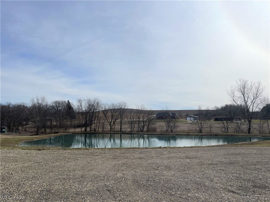 Get your house plans in place! A rare offering in Winfield, these 3.1047 acres are a perfect building spot overlooking a pond. Excellent location, only min from Dover, Dundee, Winfield and I-77.