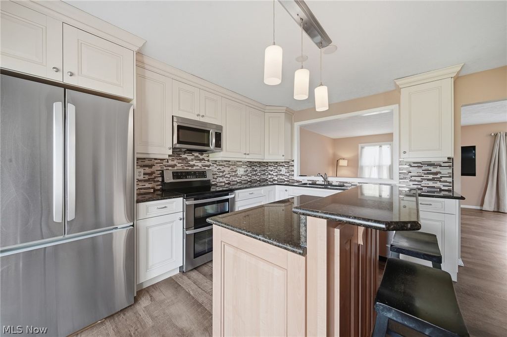 Photo of 824 S Chillicothe Road #2, Aurora, OH 44202 (MLS # 5222107)