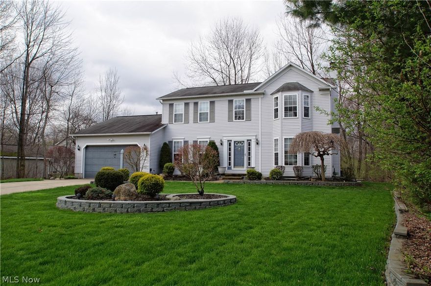 Welcome to this meticulously maintained 3 bedroom, 3.5 bath house located in a desirable Painesville Twp community. Upon entering the front door, you are greeted by a large entryway with soaring ceilings. Your first floor consists of a eat in kitchen with newer countertops, breakfast bar/island, stainless steel dishwasher, stove and microwave and updated fixtures. Also on your first floor is a formal dining room and large great room with fireplace. Don't like doing stairs to a basement for laundry duty? No problem here, this home has a first floor laundry! Upstairs features 2 generous sized bedrooms plus an updated full bath. The master bedroom has a glamour master bath, walk in closet and even features a fireplace. Fully finished basement has a rec room plus full bath, and plenty of room for storage. Newer hot water tank and 90+ efficient furnace. Your private wooded backyard features a concrete patio and plenty of room for play. Your property goes about 150' into the woods, so if you