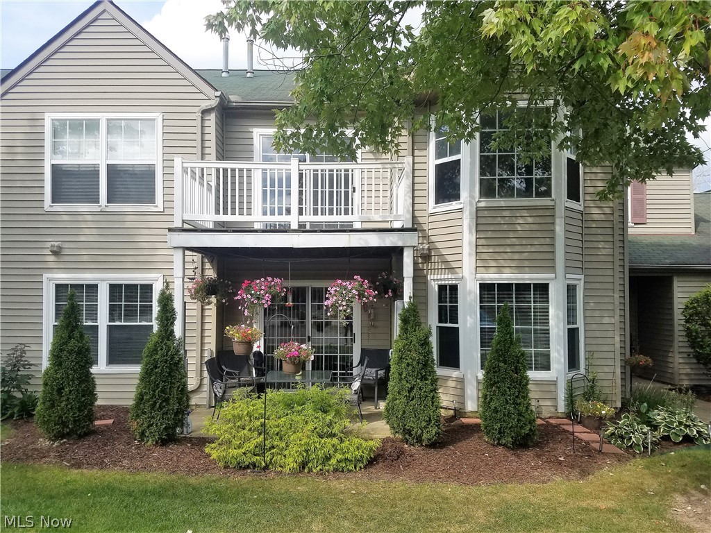 Looking for resort living in NE Ohio? Look no further! This 1st floor 2 bedroom, 2 Full Bath Condo with attached garage in Sagamore Hills offers many amenities. Swimming (indoor & out), picnicking, hiking, tennis and so much more. You'll enjoy living in this beautiful, updated condo. All you need to do is bring your furniture and move in! Enter the building at ground level either via the secured front door (unit is the first door on the left) or the 2-car garage doors (2nd garage door) and your unit is almost straight across the hallway. As you enter the door of the unit, you will note the openness from the Foyer to the Living Room to the Dining Room and into the Kitchen. To your right (while standing in Foyer), will be the Laundry Room. It will be easy to speak with your guests while cooking via the bar/opening that separates the Kitchen from the Dining area. Dining Room spills onto a lovely patio. If privacy is desired, just pull close the foldable privacy patio blinds and you will