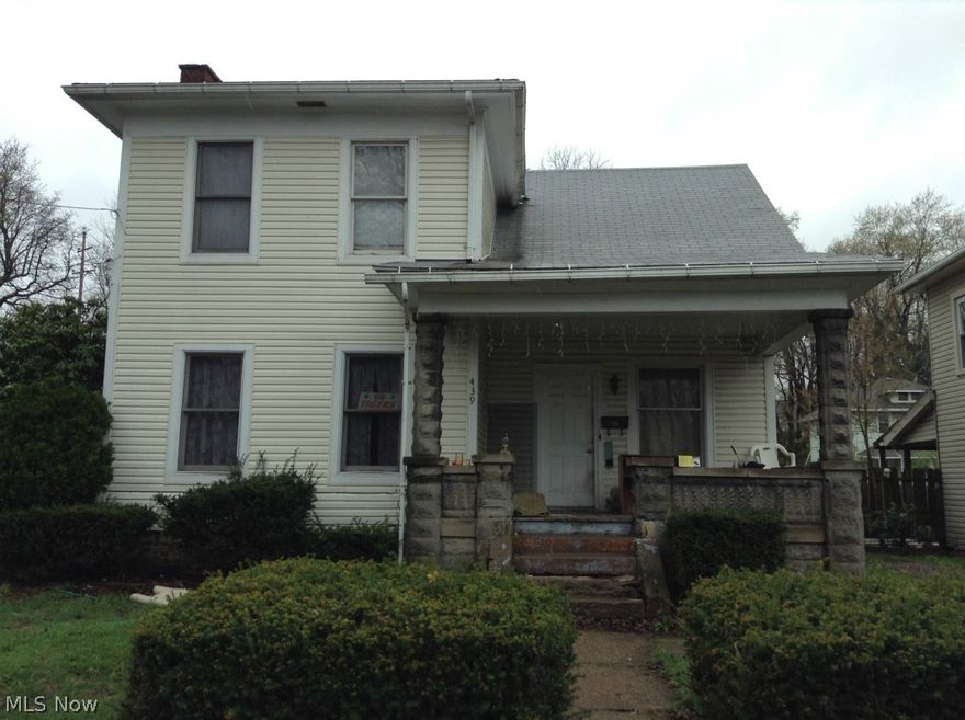 A great opportunity! This home is very spacious  - just waiting for your decorating touches!  The kitchen has newer ceramic flooring, also newer flooring in the living room and parlor!  Off street parking in rear of home. At this price, you can't go wrong!