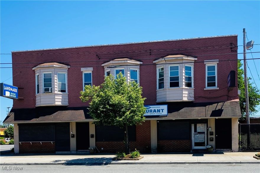 Fantastic Property!!! This well cared for mixed use commercial property offers two businesses on the street level:  a Shoe Repair shop + a fully operating Restaurant! The Landmark Restaurant has been a staple for the area for the last 20+ yrs! The upper level contains 3 tenant occupied apartments each w/ 2 bedrooms, 1 bull bath, kitchen/living room/dining room + laundry area! Seller retiring! Excellent income producing, turnkey property that transfers w/ full restaurant business for buyer to assume as their own! Bonus: Large 2nd parcel to the left of the building-rare for the area-that houses a large asphalt private parking lot for the entire building! 3 separate basements, all spaces are individually metered! Restaurant space offers full operating kitchen/public bathroom/restaurant/diner bar/full office w/ half bathroom/plenty of storage/walk in cooler+freezer + more! Brick Building! Updates include: Full concrete to back side of building, Fully done asphalt parking lot, Parking lot seal coat, Upper level Trexboard deck areas, LVT restaurant flooring, Roof over apartment 3, additional concrete back of bldg/95 ft concrete curb/drywell drainage for parking lot, island topsoil, 2 hot water tanks, Walk-in Cooler + Freezer plus refrigerant/freezer service, ADT alarm system (that stays), 2 newer furnaces, updated restaurant office bathroom/office space and Full renovation to Apartment 3! Tenant and building info in supplements. Close to shopping, freeway access, seconds from downtown, seconds from Lake Erie access, parks, hospitals and more! Prime Location! This will not last long!