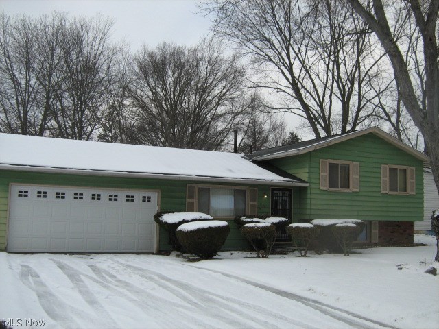 Add your decorating touches to this 1518 sq ft, 3 level split, in highly desired Copley-Fairlawn school district. Covered concrete patio overlooks super-sized, fenced backyard. Deep attached garage with workshop area. Convenient to I-77 and RT 21.