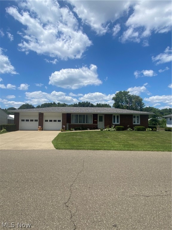 Absolutely stunning and very well maintained ranch in an established neighborhood in Coshocton. Recent updates include flooring and paint, as well as electrical, lighting, and full landscaping. The roof is 5 years old and the mechanicals are all newer as well. Three bedrooms and two bathrooms, wonderful back patio and fire-it and shed out back. The electric has been professionally run for a whole house generator. It is obvious this home has been beautifully maintained. Easy maintenance brick exterior and beautiful sunny interior make this a home you must see!