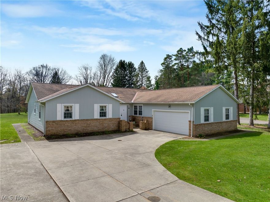 Welcome to this beautifully maintained brick and vinyl ranch offering over 2,200 sq. ft. of comfortable living space, plus a full partially finished basement! This home features a newer roof and skylights, filling the space with natural light. The enormous kitchen with a spacious eating area flows seamlessly into the inviting family room, complete with a cozy gas fireplace—perfect for everyday living and entertaining. A sliding door leads to an oversized deck overlooking the stunning lot. Throughout the home, you’ll find quality touches like solid interior doors and generous room sizes. The oversized 2.5-car garage provides ample space for vehicles, storage, or hobbies. The spacious master bedroom includes an updated full bath for added comfort and convenience. Downstairs, the finished rec room offers additional living space ideal for a media room, home gym, or play area. Set on a gorgeous 1.26-acre property, this home combines space, functionality, and charm—don’t miss your opportunity to make it yours!