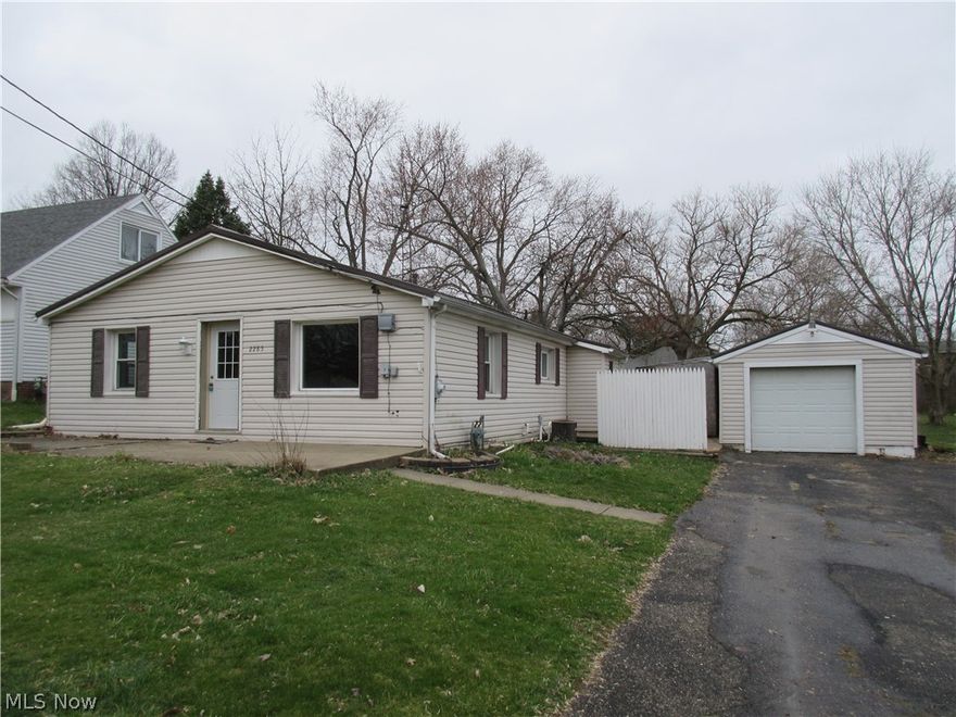 MOVE-IN & ENJOY first floor living in this 2 bedroom home on a fantastic double lot.  The super floor plan features a spacious living room, kitchen with new cabinetry, countertops, ceramic tile backsplash and first floor laundry.  Recent updates include roof, windows, hot water tank and more.  Resting on over a 1/3 acre lot with spacious back yard including a fenced in area for pets, patio area and 1 car garage with opener and electric outlets.  GREAT LOCATION AND VALUE!